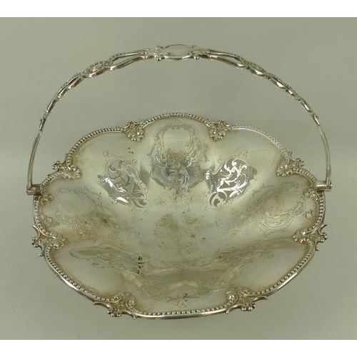 353 - A Sheffield plate table centre bowl with raised floral borders, 31 by 14cm, an entre dish with two p... 