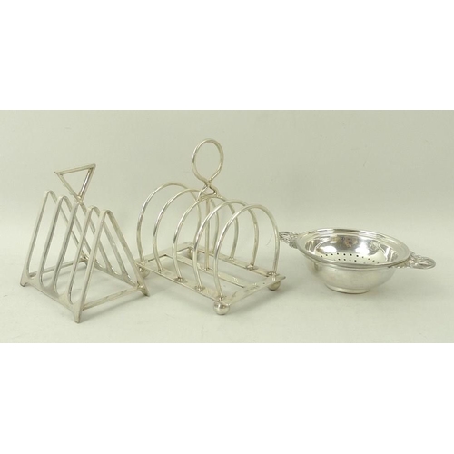 364 - A silver toast rack, Sheffield 1906, HA for Harry Atkin, a tea strainer with bowl, 1969, JG Ltd for ... 