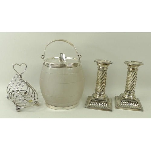 370 - A pair of plated, twisted, and fluted candle sticks, 14cm, a plated toast rack, the divisions shaped... 