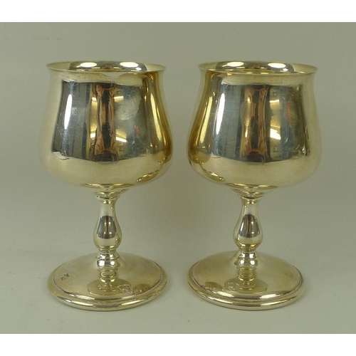 375 - A pair of consecutively numbered commemorative silver goblets, engraved to commemorate the silver we... 