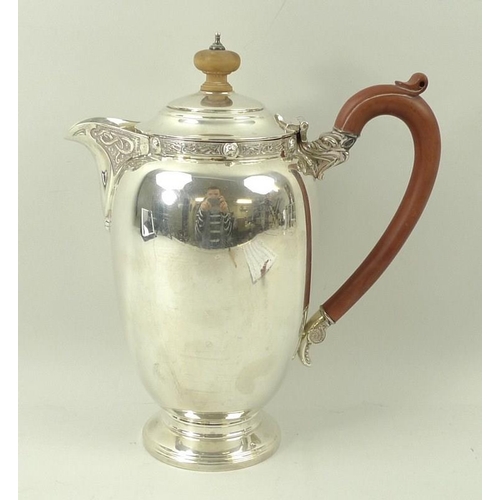 384 - A silver coffee pot, with Celtic strapwork to the collar and spout, with boxwood handle and finial, ... 