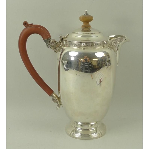 384 - A silver coffee pot, with Celtic strapwork to the collar and spout, with boxwood handle and finial, ... 