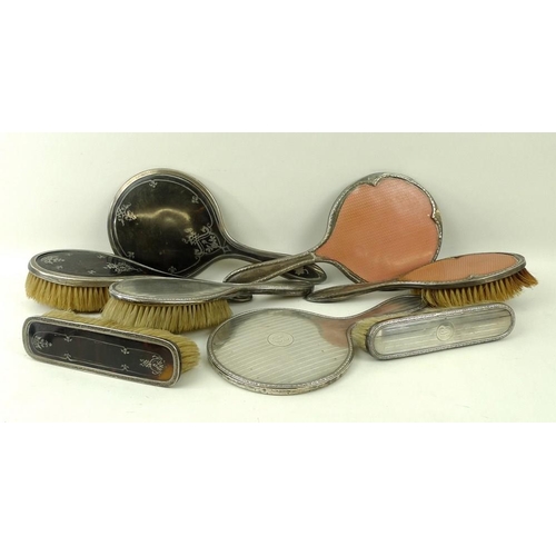 386 - A silver and tortoiseshell part dressing table set, Birmingham 1922, comprising hair brush, clothes ... 