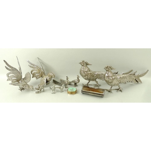 390 - A group of silver plated birds, comprising a pair of pheasants, 30 by 13cm, a pair of fighting cocks... 