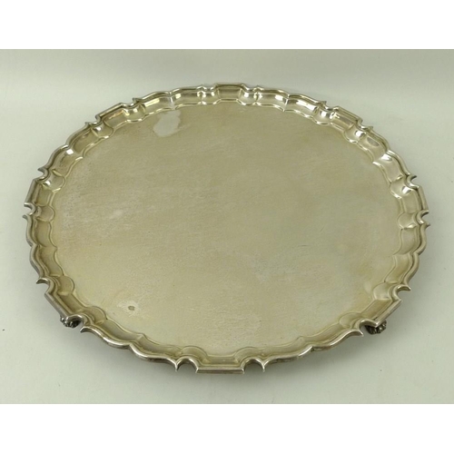 403 - A silver tray, Birmingham 1969, BES Co for Barker Ellis Silver Co, with Chippendale rim, on four cla... 