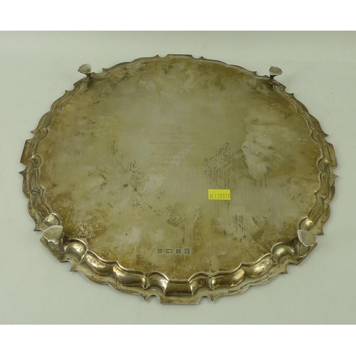 403 - A silver tray, Birmingham 1969, BES Co for Barker Ellis Silver Co, with Chippendale rim, on four cla... 