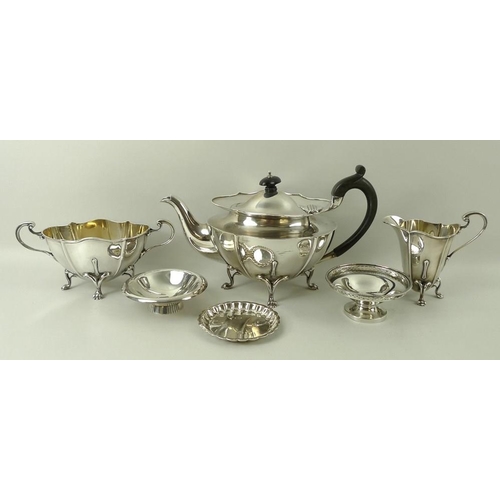 407 - An Art Nouveau silver tea set, of stylised naturalistic form, comprising tea pot, sugar bowl and cre... 