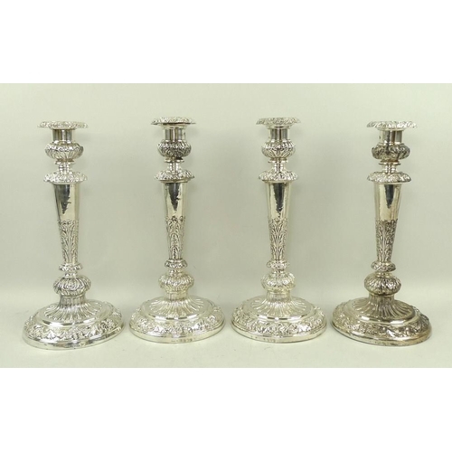 409 - A group of four Victorian silver candlesticks, with detachable candle holder to top, above a stem wi... 