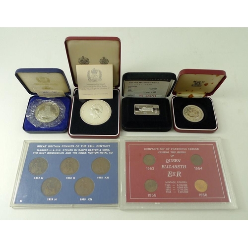 414 - A commemorative silver jubilee medal, silver ingot from Fountains Abbey, Bank of Sierra Leone, plus ... 