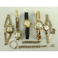 A lady's Rotary gold cased wristwatch with a 9ct gold strap, three further lady's wristwatches, a wr... 