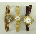 A group of lady's watches, comprising an 18ct gold cased watch with enamel dial and Arabic numerals,... 