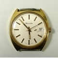 A gentleman's early 1970's Bulova wristwatch, number 3-654830, with wind mechanism, the face with ba... 