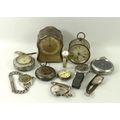 A collection of vintage clocks and watches, comprising a black faced Lemania military wristwatch, wi... 