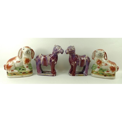 64 - A pair of Staffordshire hand painted floppy eared rabbits, 21cm, and a pair of hard paste porcelain,... 