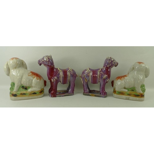 64 - A pair of Staffordshire hand painted floppy eared rabbits, 21cm, and a pair of hard paste porcelain,... 