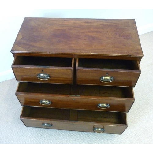 655 - A 19th century mahogany chest of two short over two long drawers, with oval brass handles, each embo... 