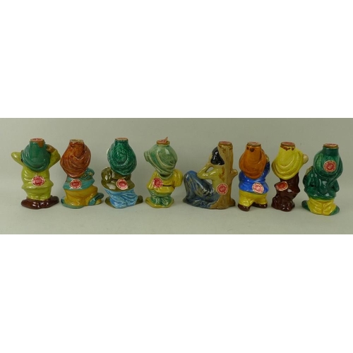 66 - A group of eight ceramic liquor bottles, hand painted and modelled as  Snow White and the Seven Dwar... 