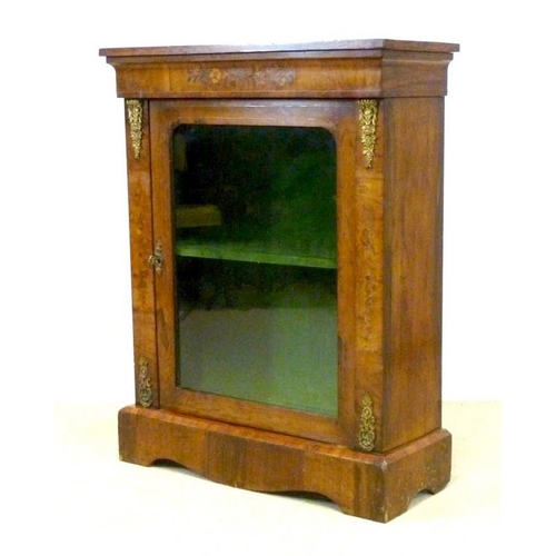 664 - A 19th century walnut and inlaid pier cabinet, with ormolu mounts, single glazed door enclosing a si... 