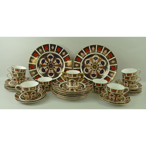 72 - A group of Royal Crown Derby porcelain, comprising seven salad plates in the Old Imari pattern, no 1... 