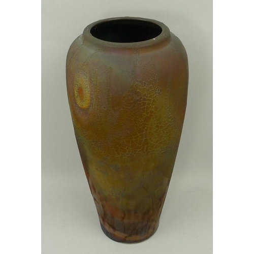 73 - A Raku studio pottery vase of shouldered, tapering form with a textured iridescent lava glaze, JG se... 