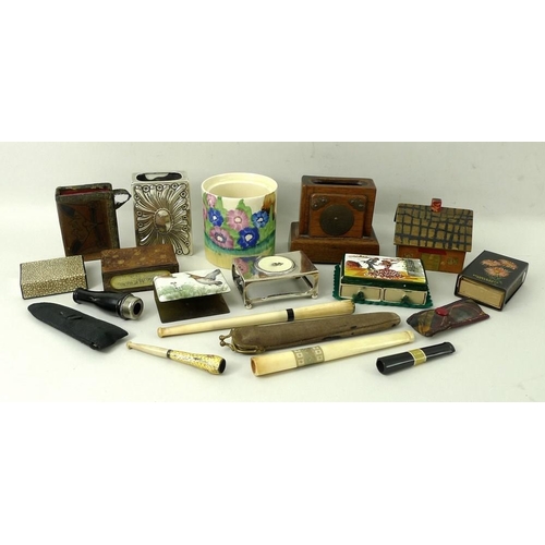 699 - Tobacciana: a collection of smoking collectables comprising matchbox holders, cigarette and cheroot ... 