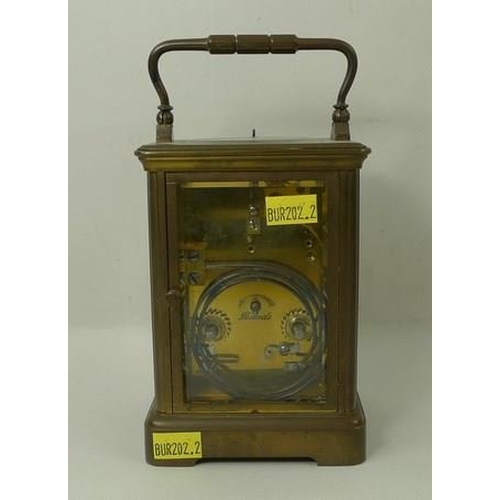 700 - A brass cased repeating carriage clock, the white enamel dial with Roman numerals, bevelled glass, a... 