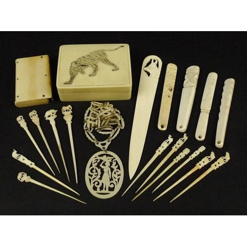 703 - A collection of early 20th century and earlier ivory items, comprising a 1920's Japanese ivory box p... 