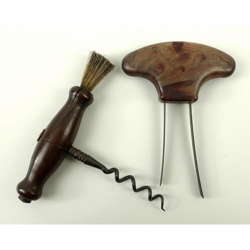 703A - A Georgian corkscrew with turned handle and badgers hair brush, and a two prong corkscrew with hardw... 