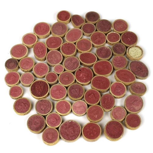 704A - A quantity of plaster classical seals and wax seals of various shapes and sizes including archbishop... 