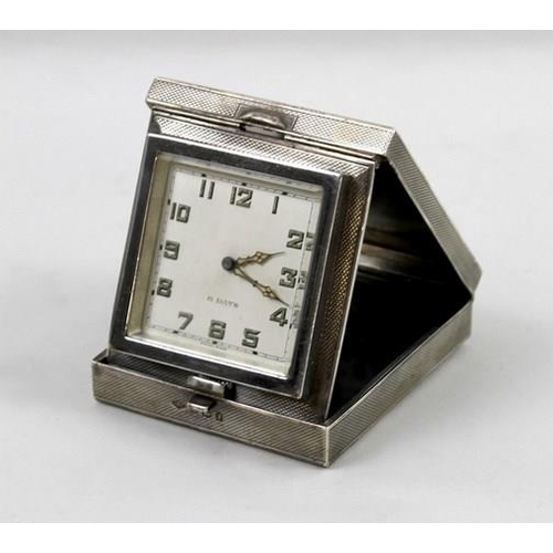 707A - A George V silver cased travelling clock, with 8 day manual wind Swiss Buren 15 jewel movement set i... 