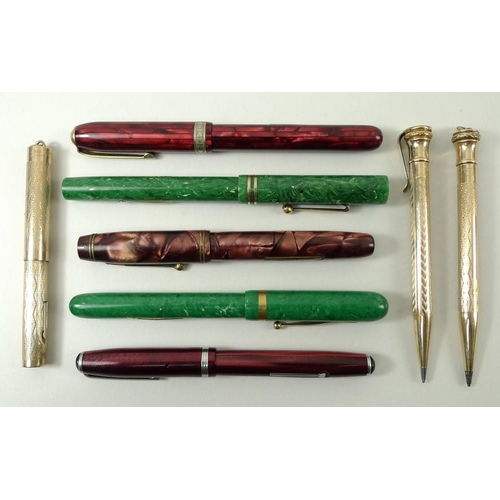 710 - A Whal Eversharp gold plated fountain pen and propelling pencil set, a propelling pencil, and a coll... 