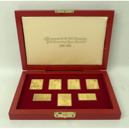 717 - A group of seven gold plated sterling silver reproduction stamps, 'The Coronation Issue', with certi... 