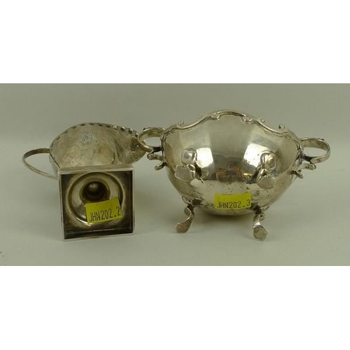 722 - A Victorian silver cream jug, with punch beaded rim on square base, Chester 1896, 10cm, and a Scotti... 