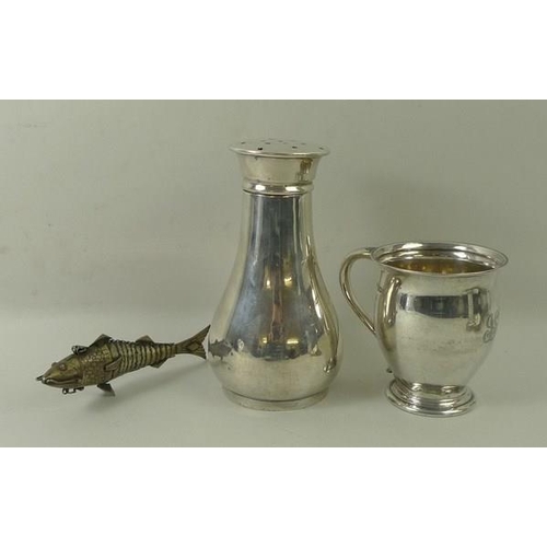 729 - A silver tankard, Sheffield 1918, Atkin Bros, a silver shaker, with star shaped holes, Birmingham 19... 