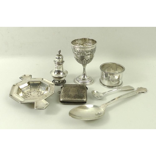 738 - A group of silver items comprising a Danish silver spoon, a Scottish mustard spoon, a tea strainer, ... 