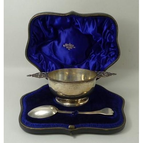 740 - A silver porringer and spoon Christening set, London 1896, Josiah Williams & Co, designed by George ... 