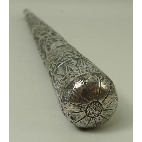 741 - An Indian silver metal parasol handle, deeply engraved with forest animals, 34cm.