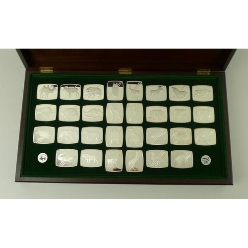 743 - A set of thirty sterling silver ingots, 'The Official World Wildlife Collection of Endangered, Rare,... 