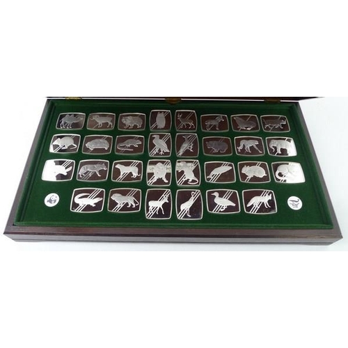 743 - A set of thirty sterling silver ingots, 'The Official World Wildlife Collection of Endangered, Rare,... 