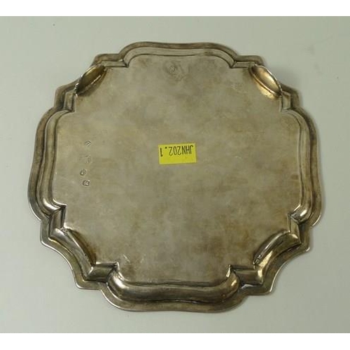 746 - A George I silver salver, London 1726, John Tuite, of square form with incuse corners, with Chippend... 