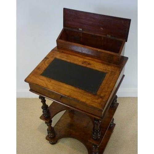 748 - A Victorian burr yew Davenport type desk, with boxwood inlay and stringing, raised on turned legs wi... 