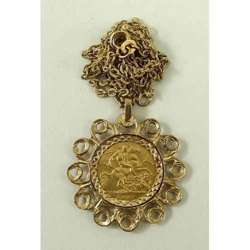 768 - An Edward VII gold half sovereign, 1907, in a 9ct gold pendant mount with gold link chain.