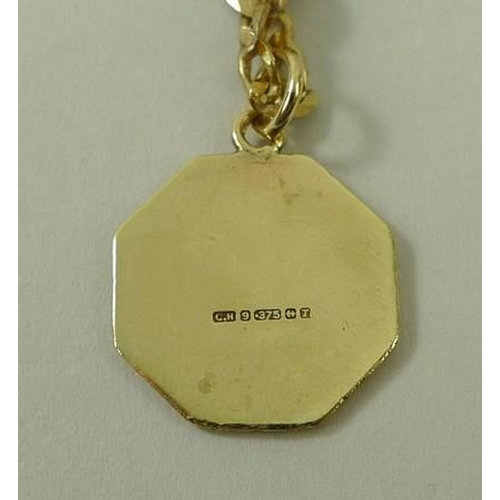 785 - A 9ct gold octagonal medallion of St Christopher, on a 9ct Italian gold chain, 52cm, 8.9g total.