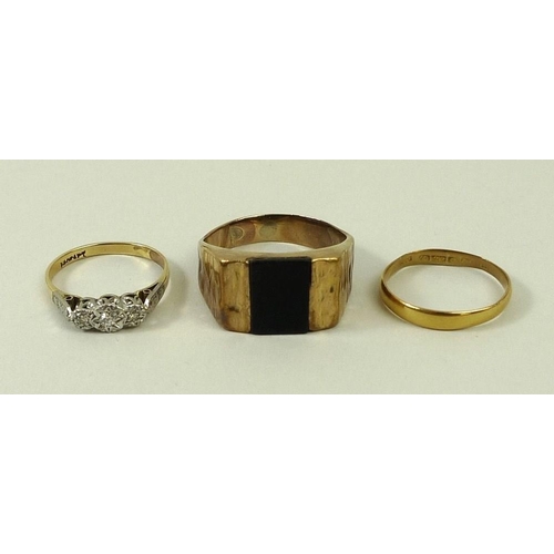 789 - A 22ct wedding band, 1.8g, size M, a yellow metal (tests at least 22ct) and three stone set ring, si... 