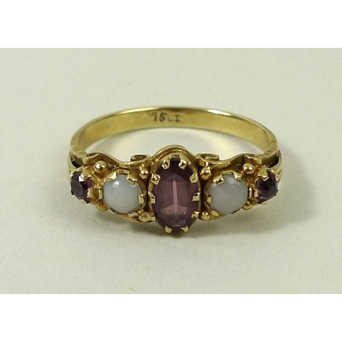 792 - A 15ct gold, amethyst and opal ring, the central oval cut amethyst flanked by two opals, and two ame... 