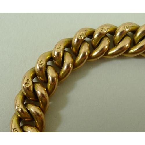 802 - A 9ct gold link bracelet with pad lock clasp and safety chain, 20.2g.