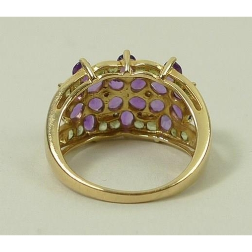 808 - A 14ct gold, diamond, amethyst and peridot dress ring, makers mark 'IW', size Q, 5.9g.