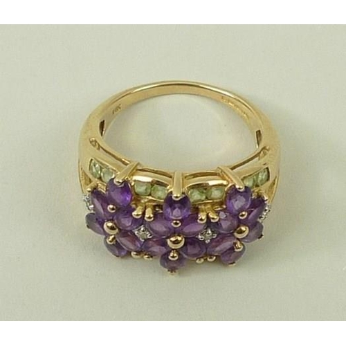 808 - A 14ct gold, diamond, amethyst and peridot dress ring, makers mark 'IW', size Q, 5.9g.