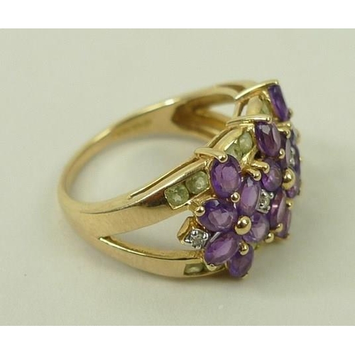 808 - A 14ct gold, diamond, amethyst and peridot dress ring, makers mark 'IW', size Q, 5.9g.