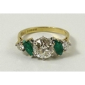 An 18ct gold, diamond and emerald five stone ring, the central old cut diamond of approximately 1.5c... 